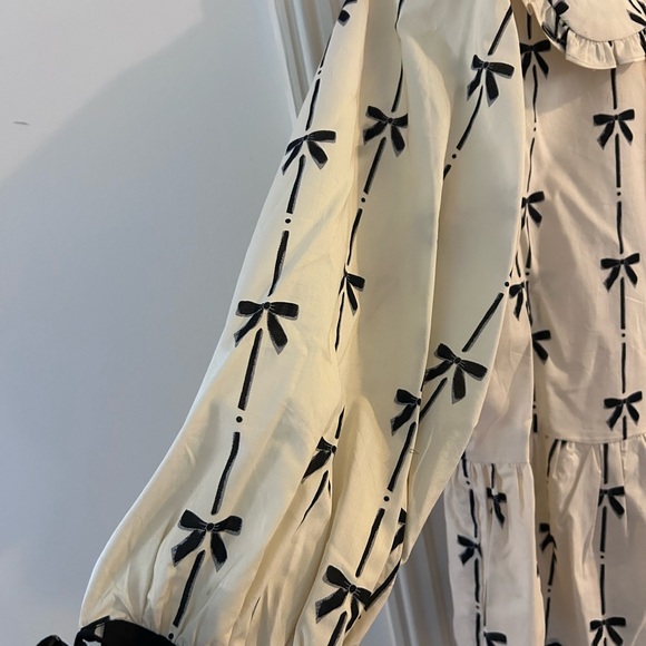 Ruffled Bow-Print Peplum Blouse in Ivory and Black - Picture 2 of 6